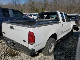 2000 Ford F-150 XL with VIN 1FTZX1727YNB23518, listed as a Copart auction lot 43914215 with 0 mi miles and Salvage Title. Bid and sale history available at carsss.com. Image 3.