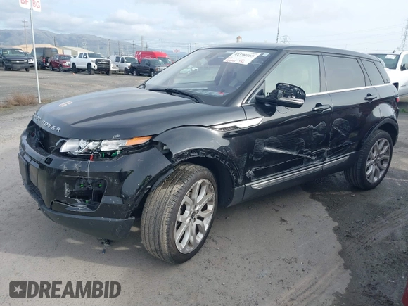 2013 Land Rover Range Rover Evoque Prestige Premium with VIN SALVV2BG8DH808674, listed as a IAAI auction lot 41590565 with 109,191 mi miles and . Bid and sale history available at DreamBid. Image 2.