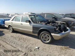 1989 Mercedes-Benz 560 with VIN WDBCA39E8KA469603, listed as a Copart auction lot 82986634 with 81,490 mi miles and Clean Title. Bid and sale history available at DreamBid. Image 4.