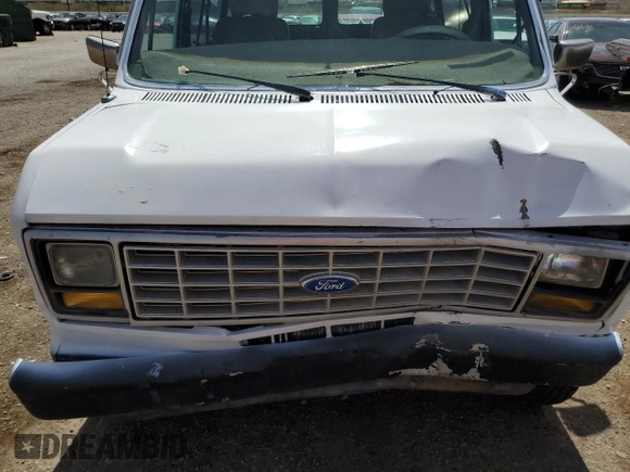1989 Ford Econoline Cargo with VIN 1FTEE14Y2KHC41026, listed as a Copart auction lot 49440055 with 54,481 mi miles and Salvage Title. Bid and sale history available at DreamBid. Image 11.