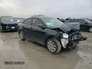 2023 Kia Rio LX with VIN 3KPA24AD7PE616450, listed as a Copart auction lot 84690444 with 28,908 mi miles and Salvage Title. Bid and sale history available at DreamBid. Image 11.