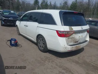 2012 Honda Odyssey EX-L with VIN 5FNRL5H65CB082916, listed as a IAAI auction lot 42052713 with 217,267 mi miles and . Bid and sale history available at carsss.com. Image 3.