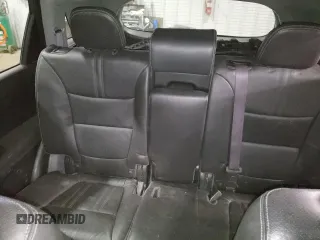 2013 Kia Sorento EX z VIN 5XYKUDA21DG411766, wystawiony jako Copart lot #55960765 z przebiegiem 159 584 mil mil oraz Szkoda całkowita • Salvage title. Historia ofert i sprzedaży dostępna na DreamBid. Obrazek 10.