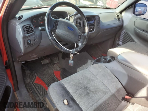 2003 Ford F-150 XL with VIN 1FTRX07W63KC66922, listed as a Copart auction lot 47565175 with 179,502 mi miles and Salvage title. Bid and sale history available at DreamBid. Image 8.