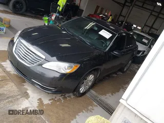 2014 Chrysler 200 Touring with VIN 1C3CCBBB9EN178972, listed as a IAAI auction lot 42197646 with Not Provided miles. Bid and sale history available at carsss.com. Image 2.