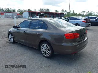 2012 Volkswagen Jetta Sedan SEL w/Sunroof with VIN 3VWLX7AJ9CM409833, listed as a IAAI auction lot 42008181 with 185,803 mi miles. Bid and sale history available at carsss.com. Image 3.