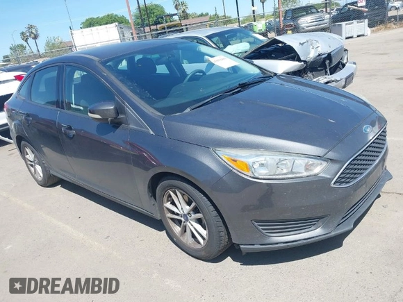 2017 Ford Focus SE z VIN 1FADP3F26HL308880, wystawiony jako IAAI lot #41991909 z przebiegiem 103 403 mil mil oraz . Historia ofert i sprzedaży dostępna na DreamBid. Obrazek 1.