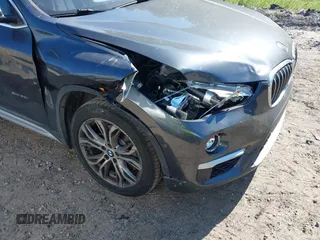 2017 BMW X1 xDrive28i with VIN WBXHT3C31H5F80056, listed as a IAAI auction lot 42049925 with 64,471 mi miles and . Bid and sale history available at DreamBid. Image 6.