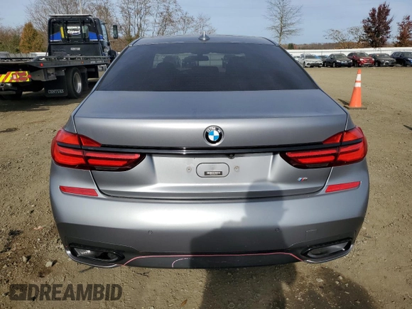 2019 BMW 7 Series 740i with VIN WBA7E2C53KB216819, listed as a Copart auction lot 76676013 with 60,928 mi miles. Bid and sale history available at carsss.com. Image 6.