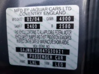 2004 Jaguar XJ with VIN SAJWA73B64TG30921, listed as a Copart auction lot 71267074 with 20,031 mi miles and Salvage Title. Bid and sale history available at carsss.com. Image 13.