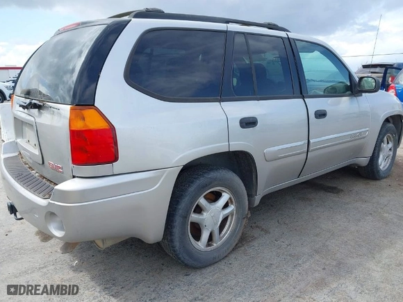 2004 GMC Envoy SLE with VIN 1GKDT13S842353029, listed as a IAAI auction lot 41938513 with 210,990 mi miles. Bid and sale history available at carsss.com. Image 4.