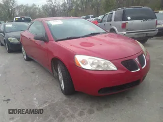 2007 Pontiac G6 GT with VIN 1G2ZH361X74191161, listed as a IAAI auction lot 34932057 with 158,154 mi miles. Bid and sale history available at carsss.com. Image 1.