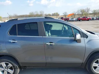 2020 Chevrolet Trax LT with VIN 3GNCJPSB7LL150297, listed as a IAAI auction lot 42077006 with 77,381 mi miles and . Bid and sale history available at DreamBid. Image 14.