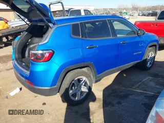 2023 Jeep Compass Sport z VIN 3C4NJDAN6PT548943, wystawiony jako IAAI lot #41631738 z przebiegiem 29 139 mil mil oraz . Historia ofert i sprzedaży dostępna na DreamBid. Obrazek 4.