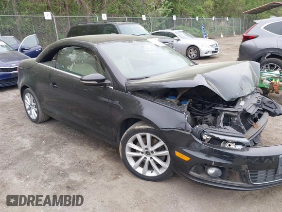 2014 Volkswagen Eos Komfort with VIN WVWBW8AH2EV001719, listed as a IAAI auction lot 42080290 with 105,661 mi miles and . Bid and sale history available at DreamBid. Image 1.