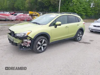 2014 Subaru Crosstrek Touring with VIN JF2GPBKC0EH279005, listed as a IAAI auction lot 42286421 with 99,720 mi miles and . Bid and sale history available at DreamBid. Image 2.