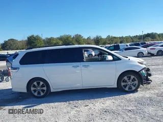 2014 Toyota Sienna SE with VIN 5TDXK3DC4ES487772, listed as a IAAI auction lot 41218295 with 153,368 mi miles and . Bid and sale history available at DreamBid. Image 13.