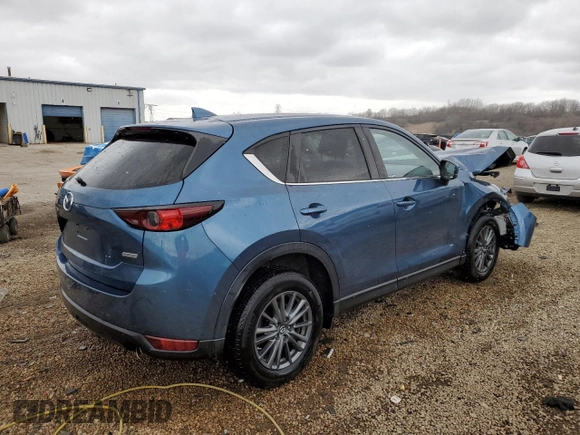 2017 Mazda CX-5 Touring z VIN JM3KFBCL2H0129000, wystawiony jako Copart lot #52107005 z przebiegiem 55 411 mil mil oraz Szkody całkowita. Historia ofert i sprzedaży dostępna na DreamBid. Obrazek 3.