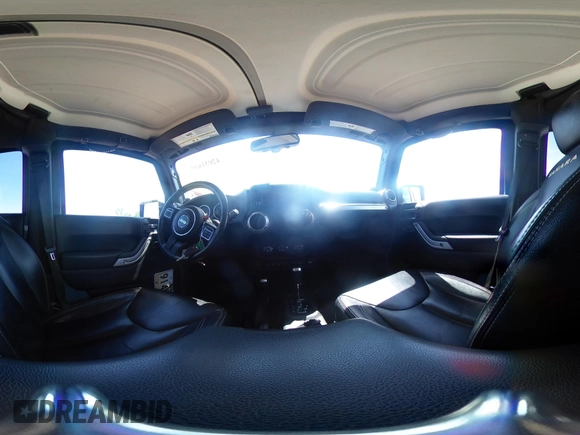 2014 Jeep Wrangler Unlimited Sahara with VIN 1C4BJWEG5EL326980, listed as a IAAI auction lot 42031659 with 116,181 mi miles and . Bid and sale history available at DreamBid. Image 23.