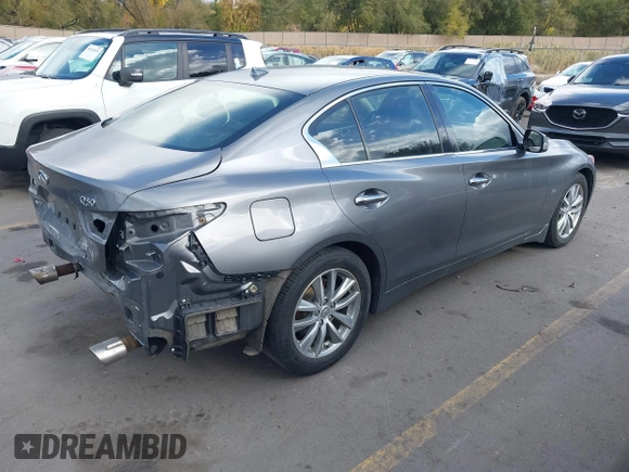2017 Infiniti Q50 Premium with VIN JN1EV7AR2HM830032, listed as a IAAI auction lot 40777161 with 104,834 mi miles and . Bid and sale history available at DreamBid. Image 4.