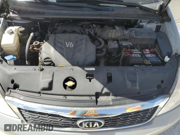 2012 Kia Sedona EX with VIN KNDMH4C72C6459882, listed as a Copart auction lot 77481744 with 136,947 mi miles and Salvage Title. Bid and sale history available at carsss.com. Image 12.
