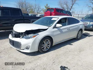 2014 Toyota Avalon Limited z VIN 4T1BK1EB9EU126369, wystawiony jako IAAI lot #41860590 z przebiegiem 135 259 mil mil oraz . Historia ofert i sprzedaży dostępna na DreamBid. Obrazek 2.
