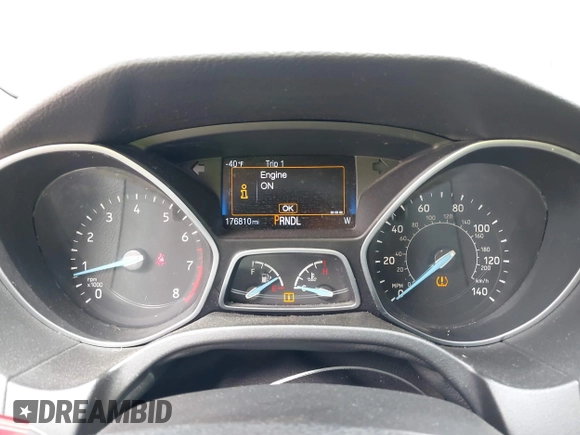 2015 Ford Focus SE z VIN 1FADP3F21FL274182, wystawiony jako IAAI lot #42441161 z przebiegiem 176 810 mil mil oraz . Historia ofert i sprzedaży dostępna na DreamBid. Obrazek 7.