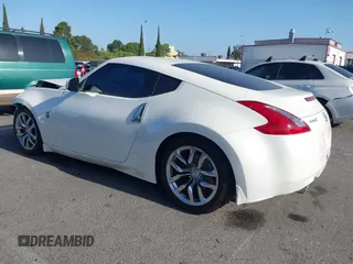 2014 Nissan 370Z Touring with VIN JN1AZ4EH7EM635655, listed as a IAAI auction lot 42217280 with 150,200 mi miles and . Bid and sale history available at DreamBid. Image 3.