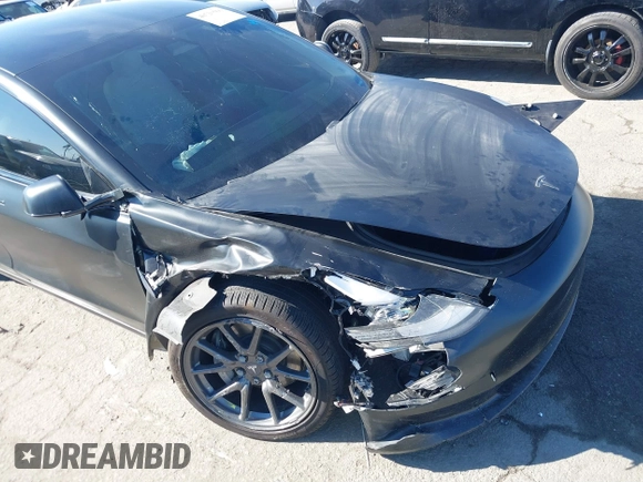 2019 Tesla Model 3 Mid Range with VIN 5YJ3E1EA0KF509547, listed as a IAAI auction lot 40720566 with 41,655 mi miles and . Bid and sale history available at DreamBid. Image 6.