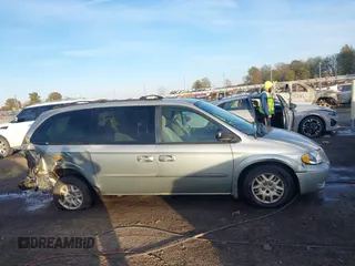 2003 Dodge Grand Caravan with VIN 2D4GP443X3R277421, listed as a IAAI auction lot 41035290 with 243,568 mi miles and . Bid and sale history available at DreamBid. Image 13.
