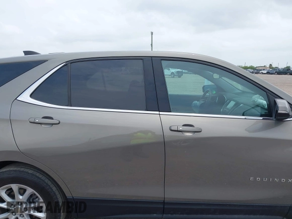 2018 Chevrolet Equinox LT with VIN 3GNAXJEV1JS526049, listed as a IAAI auction lot 42309132 with 89,965 mi miles and . Bid and sale history available at DreamBid. Image 13.