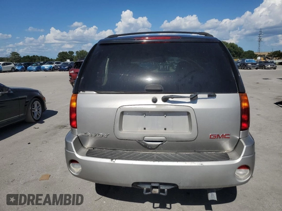 2004 GMC Envoy SLT с VIN 1GKDS13S542129977, выставлен на аукционе Copart как лот 61170465 с пробегом 129 897 миль миль и Списание • Salvage title. История ставок и продаж доступна на DreamBid. Изображение 6.