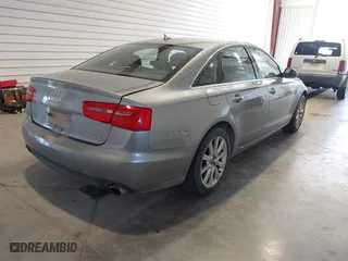 2013 Audi A6 3.0T Premium Plus with VIN WAUGGAFC3DN066310, listed as a IAAI auction lot 42020702 with 195,939 mi miles. Bid and sale history available at carsss.com. Image 4.