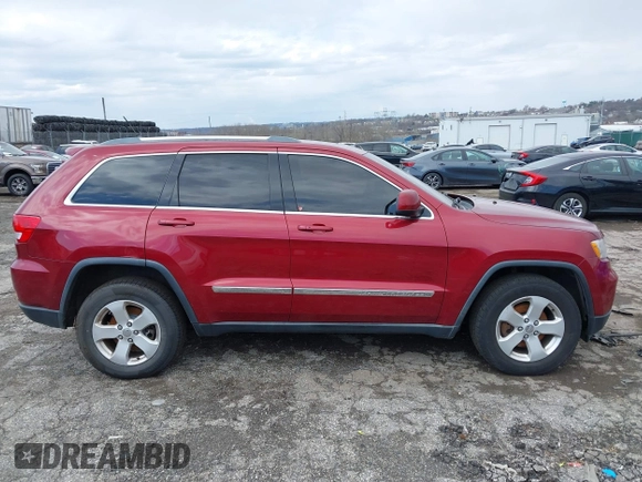 2012 Jeep Grand Cherokee Laredo with VIN 1C4RJFAG7CC221682, listed as a IAAI auction lot 41881922 with 218,762 mi miles. Bid and sale history available at carsss.com. Image 13.
