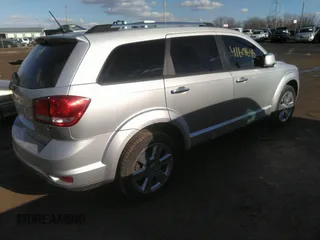 2014 Dodge Journey Limited with VIN 3C4PDCDG9ET157841, listed as a IAAI auction lot 41609646 with 130,329 mi miles and . Bid and sale history available at DreamBid. Image 4.