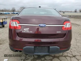 2011 Ford Taurus SEL z VIN 1FAHP2EW4BG167369, wystawiony jako Copart lot #52797525 z przebiegiem 98 696 mil mil oraz Czysty tytuł • Clean title. Historia ofert i sprzedaży dostępna na DreamBid. Obrazek 6.