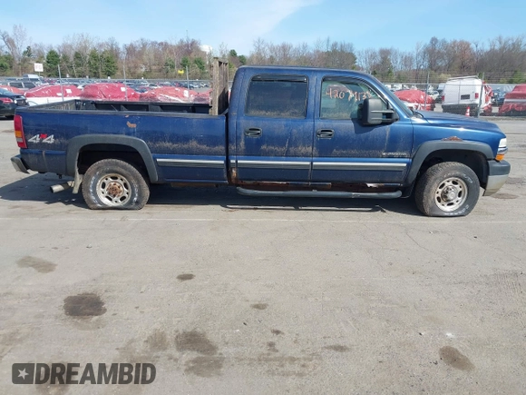 2002 Chevrolet Silverado 2500HD LS with VIN 1GCHK23U52F128404, listed as a IAAI auction lot 42079138 with 153,613 mi miles. Bid and sale history available at carsss.com. Image 13.