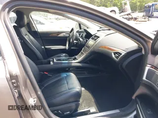 2016 Lincoln MKZ z VIN 3LN6L2J97GR617086, wystawiony jako IAAI lot #42446924 z przebiegiem 107 591 mil mil oraz . Historia ofert i sprzedaży dostępna na DreamBid. Obrazek 5.