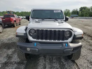 2024 Jeep Wrangler Rubicon with VIN 1C4RJXR6XRW292478, listed as a Copart auction lot 55655575 with 11,122 mi miles and Salvage Title. Bid and sale history available at carsss.com. Image 6.