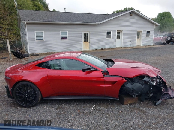 2023 Aston Martin Vantage z VIN SCFSMGAW8PGN08275, wystawiony jako IAAI lot #40460970 z przebiegiem 2 602 mil mil oraz . Historia ofert i sprzedaży dostępna na DreamBid. Obrazek 14.