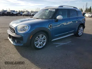 2017 MINI Countryman Cooper S with VIN WMZYT3C37H3B66319, listed as a Copart auction lot 77805204 with 65,452 mi miles and Salvage Title. Bid and sale history available at carsss.com. Image 1.