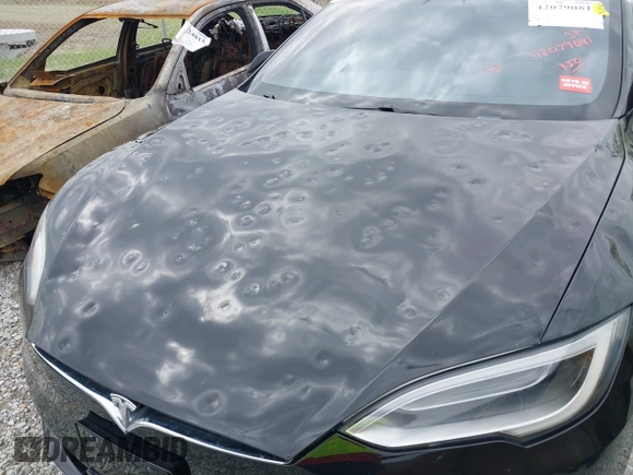 2018 Tesla Model S 75D with VIN 5YJSA1E2XJF248751, listed as a IAAI auction lot 42079081 with 75,904 mi miles and . Bid and sale history available at DreamBid. Image 20.