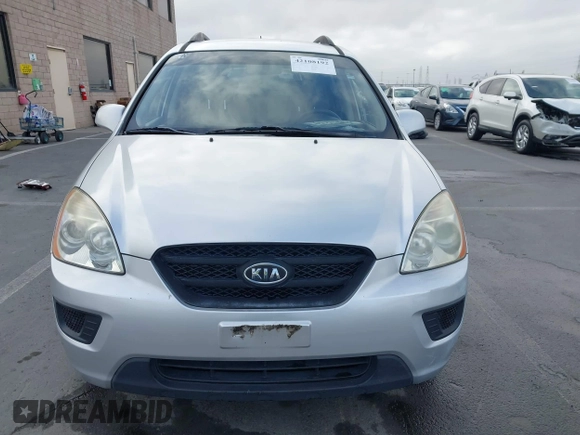2009 Kia Rondo LX with VIN KNAFG528497222225, listed as a IAAI auction lot 42108192 with 113,040 mi miles. Bid and sale history available at carsss.com. Image 13.