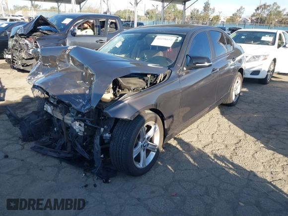 2013 BMW 3 Series 328i with VIN WBA3C1C56DK103447, listed as a IAAI auction lot 41698652 with 79,473 mi miles. Bid and sale history available at carsss.com. Image 2.