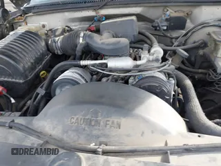 1999 GMC Yukon with VIN 1GKEK13R2XJ712390, listed as a IAAI auction lot 41793649 with 222,721 mi miles. Bid and sale history available at carsss.com. Image 10.