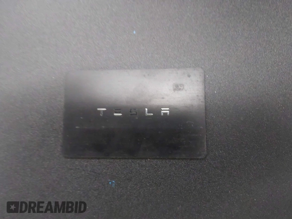 2020 Tesla Model 3 Long Range with VIN 5YJ3E1EB0LF803217, listed as a IAAI auction lot 41871940 with 130,391 mi miles. Bid and sale history available at carsss.com. Image 11.