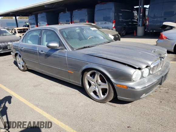 2005 Jaguar XJ with VIN SAJWA79C15SG40523, listed as a Copart auction lot 77994844 with 113,634 mi miles and Clean Title. Bid and sale history available at carsss.com. Image 4.