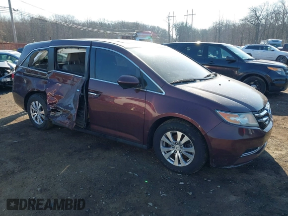 2014 Honda Odyssey EX-L with VIN 5FNRL5H60EB009083, listed as a IAAI auction lot 41633419 with 219,930 mi miles and . Bid and sale history available at carsss.com. Image 1.