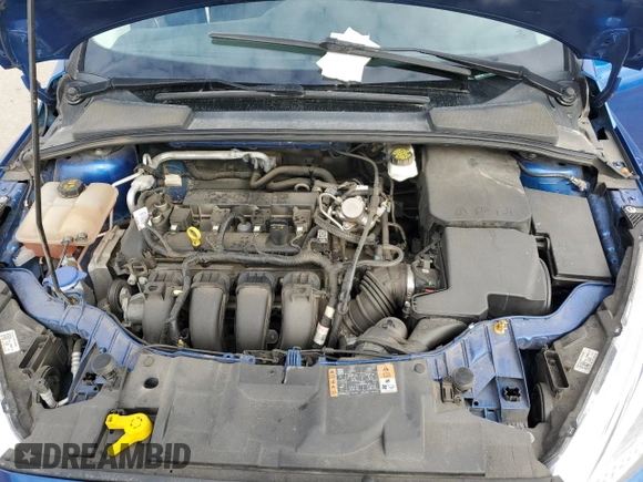 2018 Ford Focus SE z VIN 1FADP3F27JL260280, wystawiony jako Copart lot #54690975 z przebiegiem 73 322 mil mil oraz Szkoda całkowita • Salvage title. Historia ofert i sprzedaży dostępna na DreamBid. Obrazek 11.