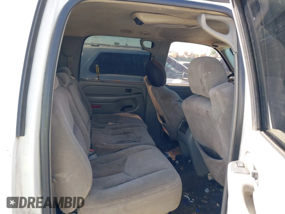 2005 Chevrolet Suburban LT z VIN 1GNEC16ZX5J100236, wystawiony jako IAAI lot #41920678 z przebiegiem 221 124 mil mil oraz . Historia ofert i sprzedaży dostępna na DreamBid. Obrazek 8.